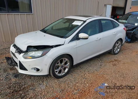 2012 Ford Focus Titanium z USA, uszkodzony, nr VIN 1FAHP3J2XCL346937